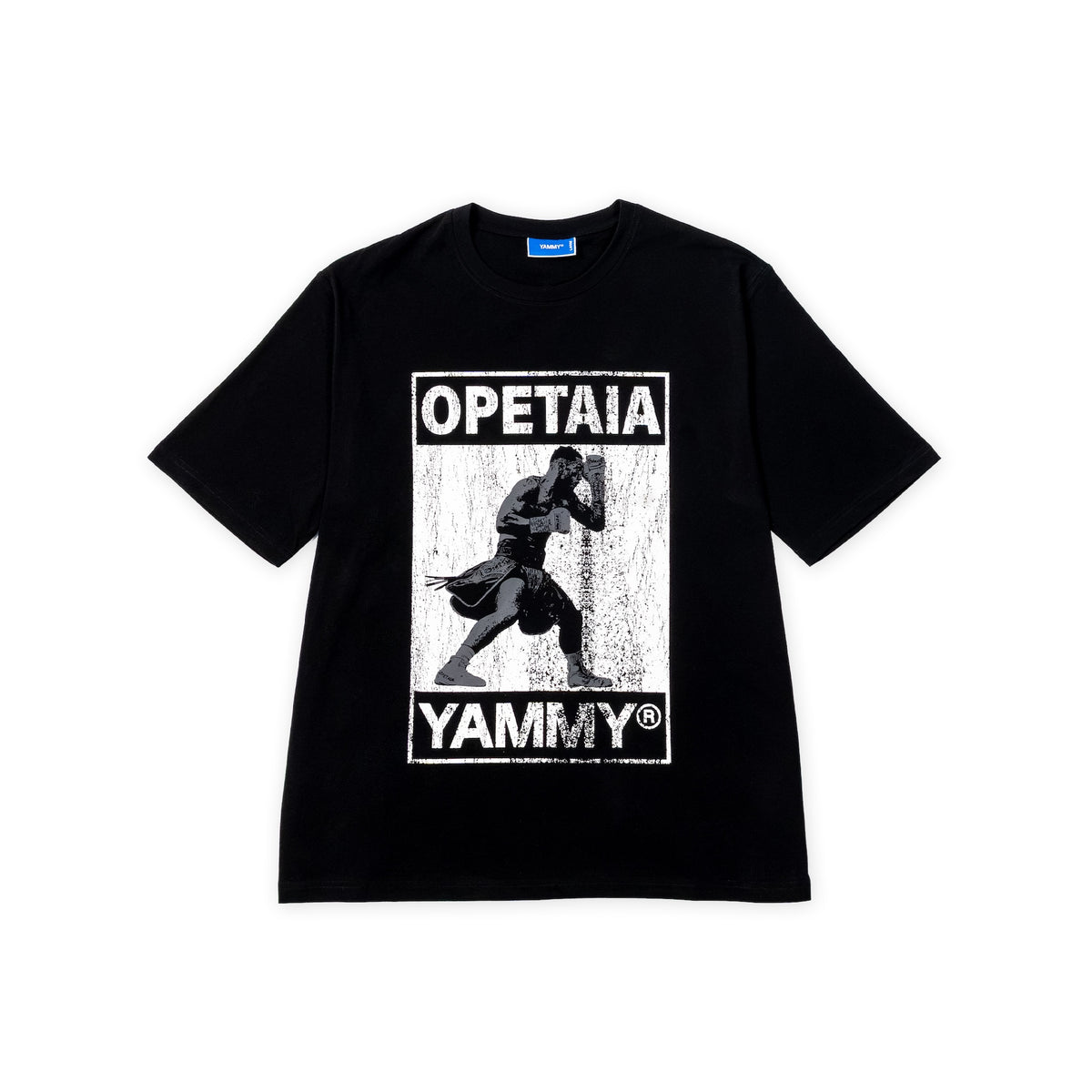 A black short-sleeve t-shirt with a distressed white graphic print on the front featuring Jai Opetaia and the text 'OPETAIA' and 'YAMMY'.