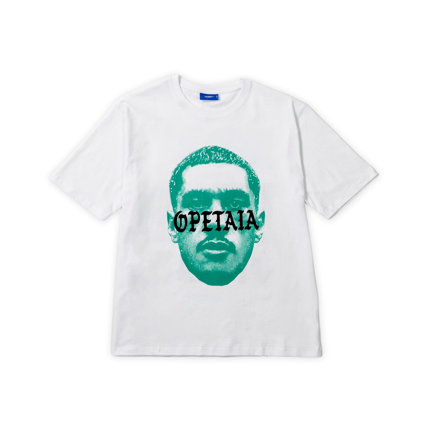 A white short-sleeve crewneck t-shirt featuring a stylized teal graphic of Jai Opetaia with the word 'OPETAIA' printed across the eyes, displayed flat against a white background.