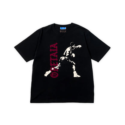 A black short-sleeve graphic t-shirt by Uss, featuring a distressed white silhouette of Jai Opetaia and vertical red text reading 'OPETAIA' on the front, laid flat against a white background.
