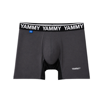 Dark gray men's boxer briefs with a black elastic waistband featuring the brand name 'YAMMY' in white. The underwear is laid flat against a light gray background.