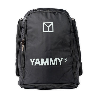 A black YAMMY brand backpack with white printed logos on the front, shown against a plain white background.