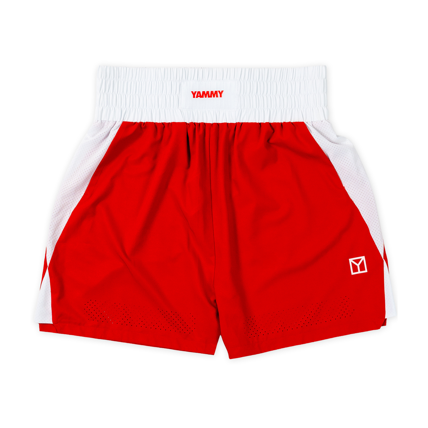 Red and white athletic shorts with a white elastic waistband featuring the red 'YAMMY' brand logo. The side panels are white mesh, and a small white geometric logo is printed on the lower left leg.