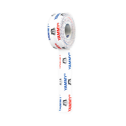 A roll of white tape with a repeating pattern of the brand name 'YAMMY' in blue and red, alongside Hector Cat, shown on a plain white background.